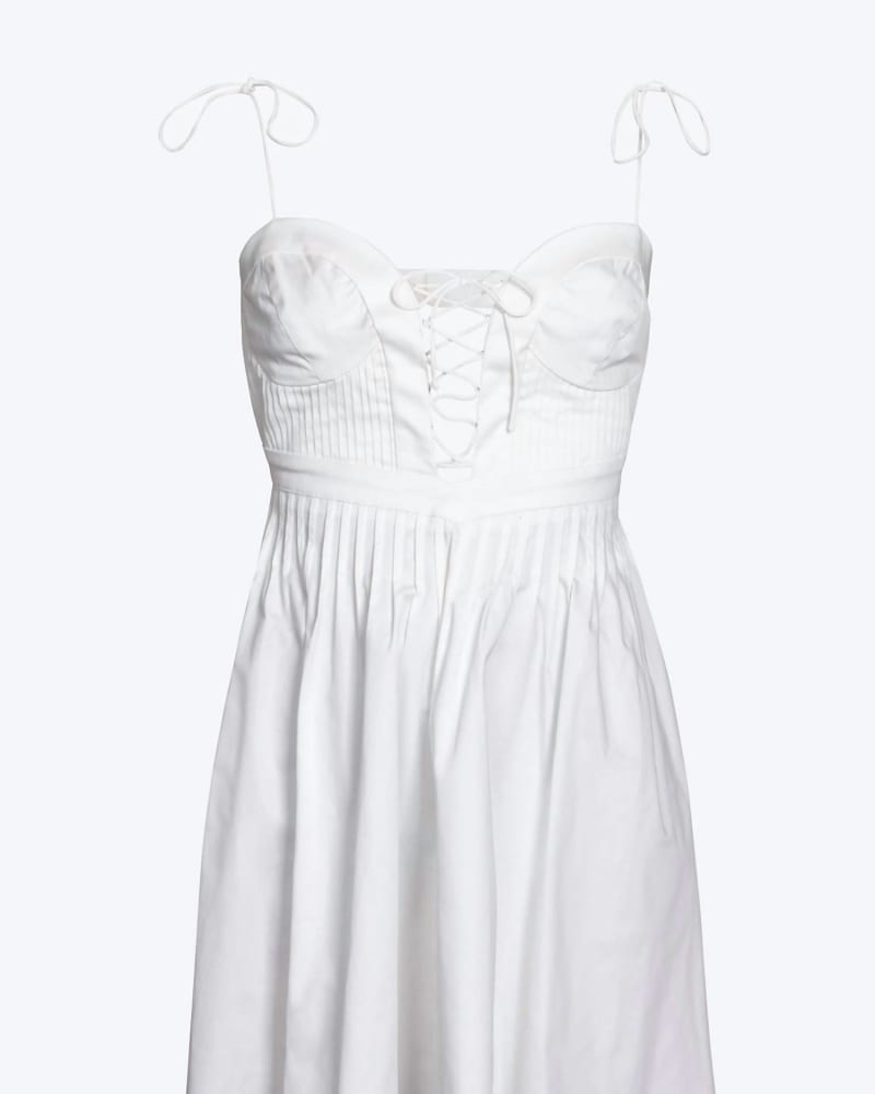 Front of a model wearing a size XL Sierra Lace-Up Open-Back Poplin Mini Dress in White in White by for Love & Lemons. | dia_product_style_image_id:345918